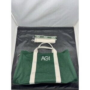 AG1 Duffle Bag Unisex Green Canvas White Handles Accents Adjustable Strap NWOT